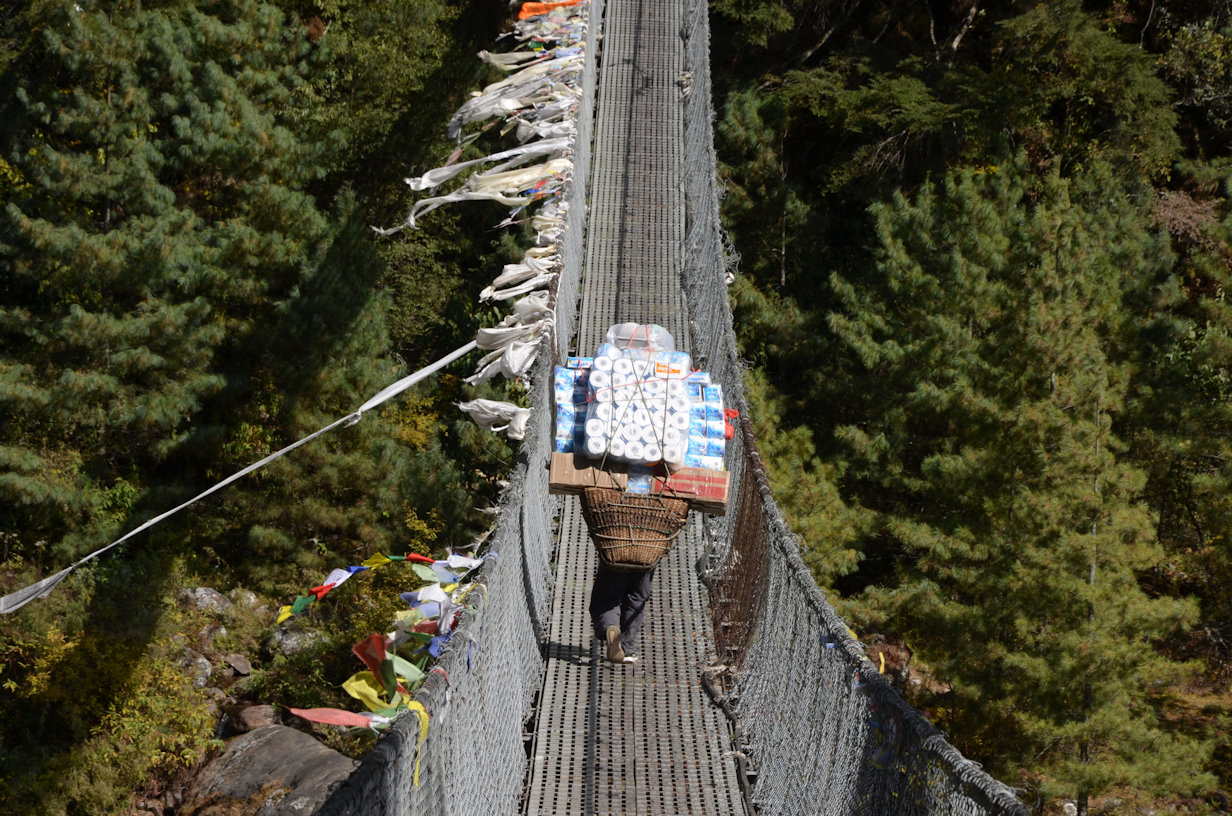 Sherpa crossing the wire bridge Sherpa crossing the wire bridge